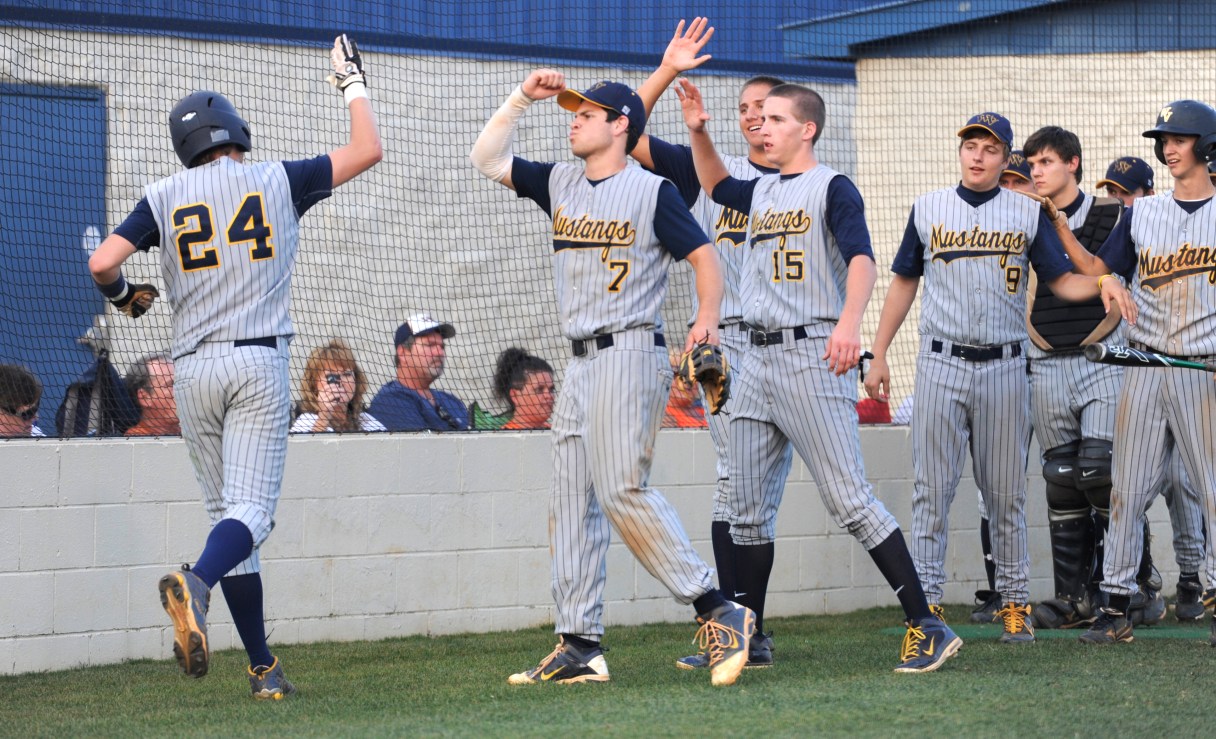 mustangs-top-trojans-5-aaa-title