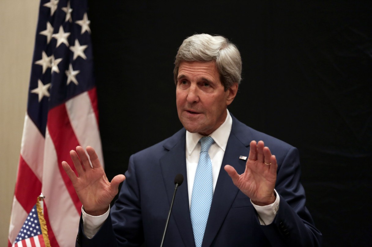 U.S. Secretary of State John Kerry speaks during a joint news conference with Egyptian Foreign Minister Sameh Shoukry following his meeting with Egyptian President Abdel-Fattah el-Sissi, Sunday, June 22, 2014, in Cairo, Egypt. (AP Photo/Maya Alleruzzo)