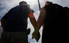 A married couple holds hands in Lewisville, Texas. Despite a boom in the use of pregnancy-aiding medical techniques, a new government study released Wednesday suggests the percentage of married couples having trouble conceiving has actually dropped slightly in recent years.