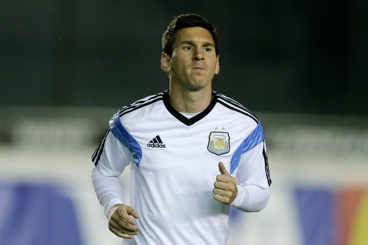 Argentina's Lionel Messi jogs during an official training session at Vasco da Gama Stadium a day before the World Cup soccer final between Germany and Argentina in Rio de Janeiro, Brazil, Saturday, July 12, 2014. (AP Photo/Victor R. Caivano)