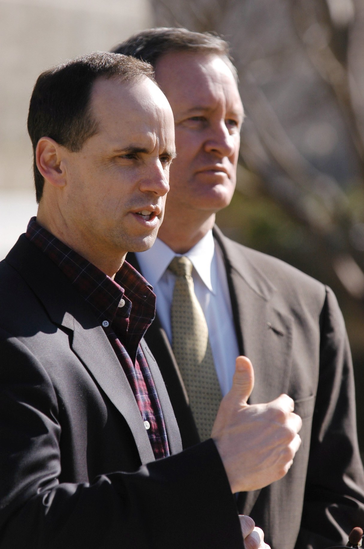 FILE - In this March 2003 file photo, Micron Technology CEO Steve Appleton, left, speaks accompanied by Idaho Sen. Mike Crapo in Idaho. A report released Monday, Sept. 8, 2014 says the likely causes of a 2012 airplane crash that killed the head of the memory chip maker are a decrease in engine power during takeoff and the Appleton's ill-fated decision to turn the experimental plane around rather than make an emergency landing, federal investigators say. (AP Photo/The Idaho Statesman, Chris Butler)