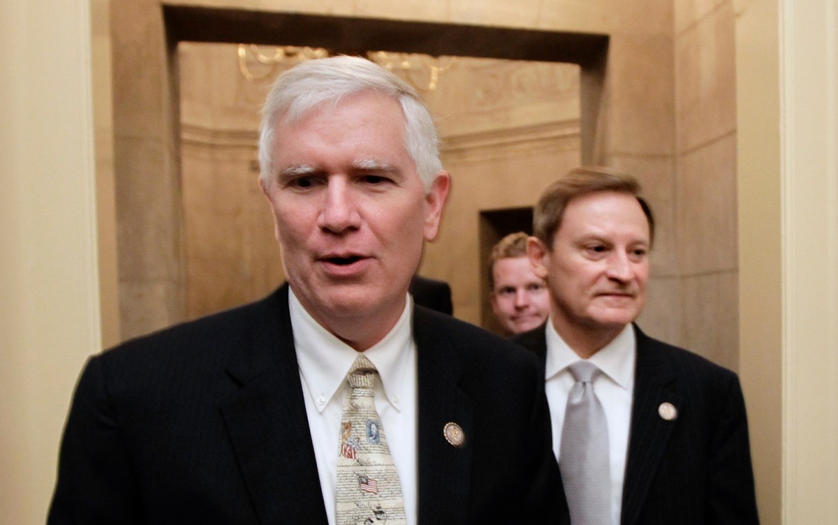 FILE - This July 28, 2011 file photo shows Rep. Mo Brooks, R-Ala., left, on Capitol Hill in Washington. The tea party may have learned its lesson. As Congress finishes work on a must-pass spending bill set for votes next week, the most conservative lawmakers on Capitol Hill are eager to send a message on immigration, and stand firm against a government lending bank. But a year after they forced a 16-day partial government shutdown over President Barack Obama’s health care law, few seem to have the stomach to push their demands that far again. "No question we learned that with the aid of the news media the Democrats were able to pin the blame on us" for last year’s shutdown, said Brooks. (AP Photo/J. Scott Applewhite, File)