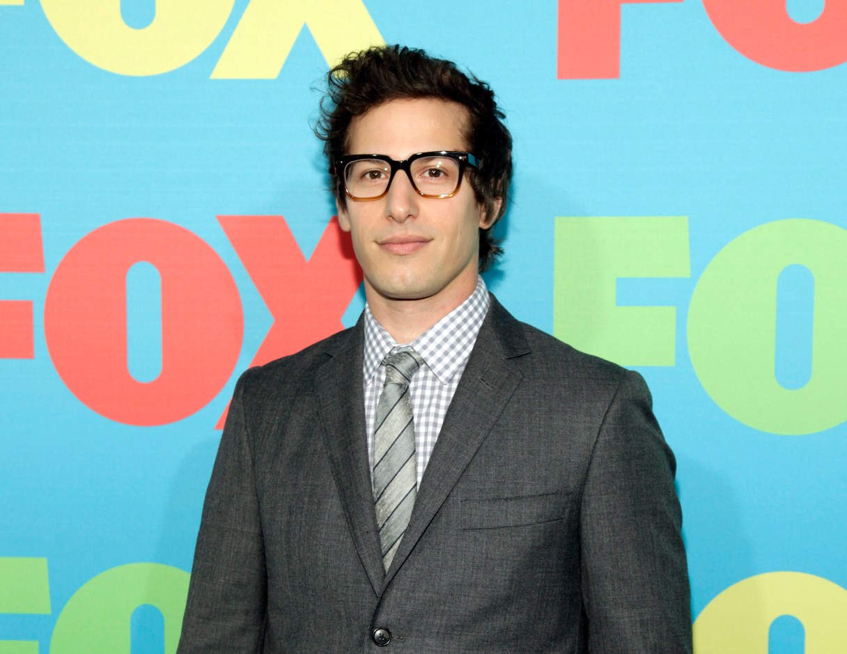 FILE - In this May 12, 2014 file photo, actor Andy Samberg attends the FOX Network 2014 Upfront event, in New York. Samberg is taking center stage at the Emmy Awards. Fox said Thursday, March 12, 2015, that Samberg, star of the network's sitcom "Brooklyn Nine-Nine," will host the September ceremony. (Photo by Andy Kropa/Invision/AP, File)