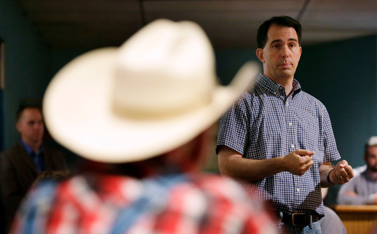 Republican presidential candidate, Wisconsin Gov. Scott Walker ,speaks during a meet and greet with local residents, Thursday, Aug. 27, 2015, in Guthrie Center, Iowa. (AP Photo/Charlie Neibergall)