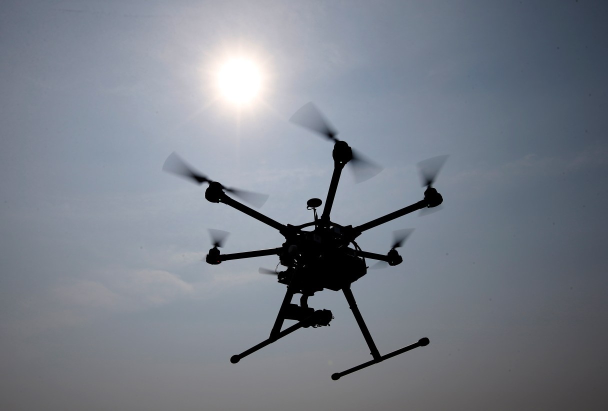 FILE - In this June 11, 2015 file photo, a hexacopter drone is flown in Cordova, Md. Pilot reports of drone sightings so far this year are more than double last year, the Federal Aviation Administration reported Thursday. ¶ There have been more than 650 reports this year by pilots of unmanned aircraft flying near manned aircraft, according to the FAA. There were 238 drone sightings in all of 2014. (AP Photo/Alex Brandon, File)