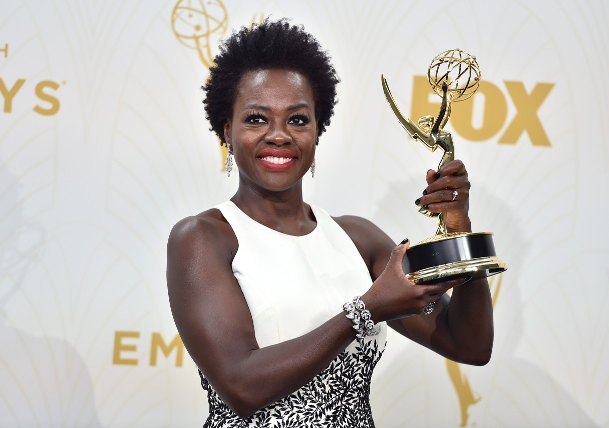 Viola Davis poses in the press room with the award for outstanding lead actress in a drama series for “How to Get Away With Murder” at the 67th Primetime Emmy Awards on Sunday, Sept. 20, 2015, at the Microsoft Theater in Los Angeles. (Photo by Jordan Strauss/Invision/AP)