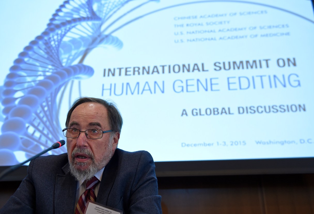 Nobel laureate David Baltimore of CalTech speaks to reporters at the National Academy of Sciences international summit on the safety and ethics of human gene editing, Tuesday, Dec. 1, 2015, in Washington. Alternating the promise of cures for intractable diseases with anxiety about designer babies and eugenics, hundreds of scientists and ethicists from around the world began debating the boundaries of a revolutionary technology to edit the human genetic code. (AP Photo/Susan Walsh)