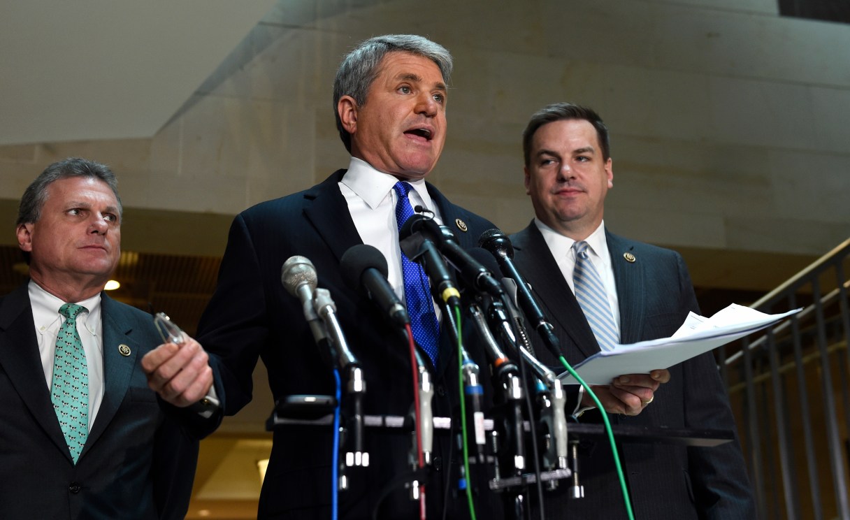 House Homeland Security Committee Chairman Rep. Michael McCaul, R-Texas, center, flanked by Rep. Buddy Carter R-Ga., left, and Rep. Richard Hudson, R-N.C., speaks to reporters on Capitol Hill in Washington, Friday, Jan. 8, 2016, about the arrest of two Iraqi-born men who came to the U.S. as refugees and were indicted on terrorism-related charges by federal authorities. (AP Photo/Susan Walsh)
