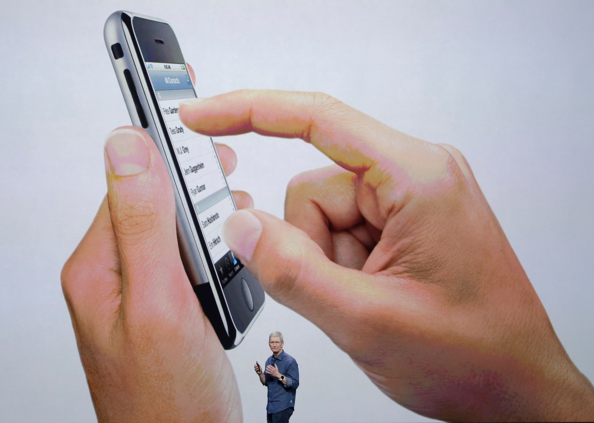 In this Sept. 9, 2014, file photo, Apple CEO Tim Cook speaks during an announcement of new products in Cupertino, Calif. Faced with a federal judge's order to help investigators break into an iPhone allegedly used by one of the San Bernardino, Calif., shooters, Apple may well argue that the request would place an unreasonable burden on the company. In fact, doing what the government asks is not likely to be a tough technical feat for Apple. But doing so might have dramatic consequences on the data security of the millions of iPhone users around the world. (AP Photo/Marcio Jose Sanchez, File)