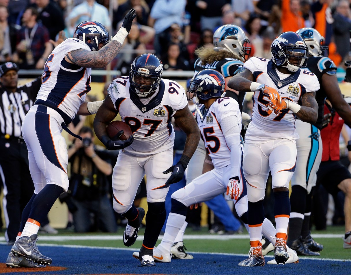 Denver Broncos’ Malik Jackson (97) celebrates after scoring a touchdown during the first half of the NFL Super Bowl 50 football game Sunday, Feb. 7, 2016, in Santa Clara, Calif. (AP Photo/Jeff Chiu)