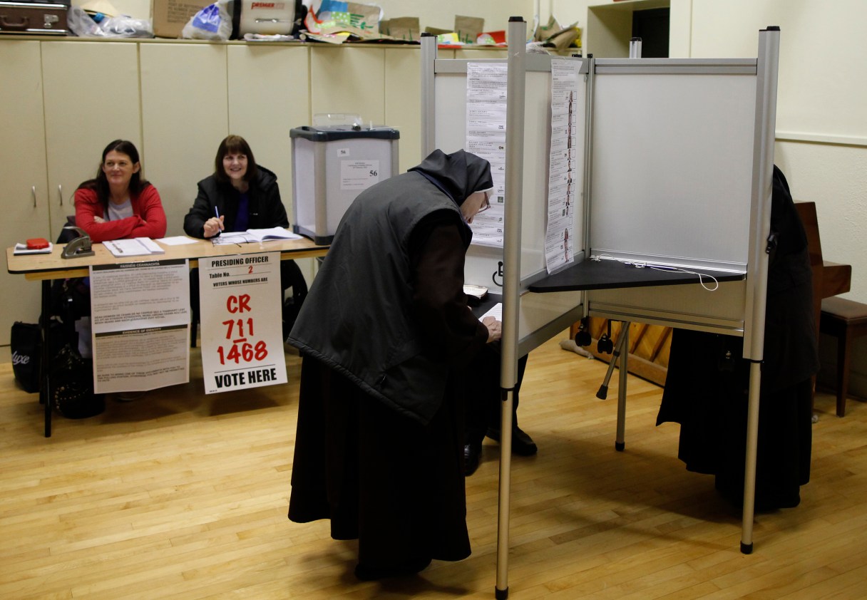 Carmelite Sisters prepare to cast their vote in North Dublin, Ireland, Friday, Feb. 26, 2016. Ireland’s voters were deciding Friday who should lead their economically rebounding nation for the next five years, with polls suggesting the outcome could be a hung parliament. (AP Photo/Peter Morrison)
