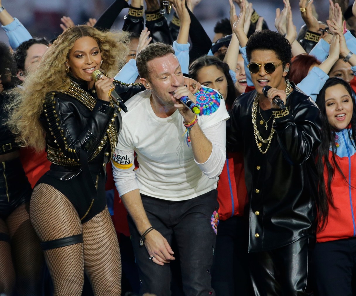 Beyoncé, Coldplay singer Chris Martin and Bruno Mars perform during halftime of the NFL Super Bowl 50 football game Sunday, Feb. 7, 2016, in Santa Clara, Calif.