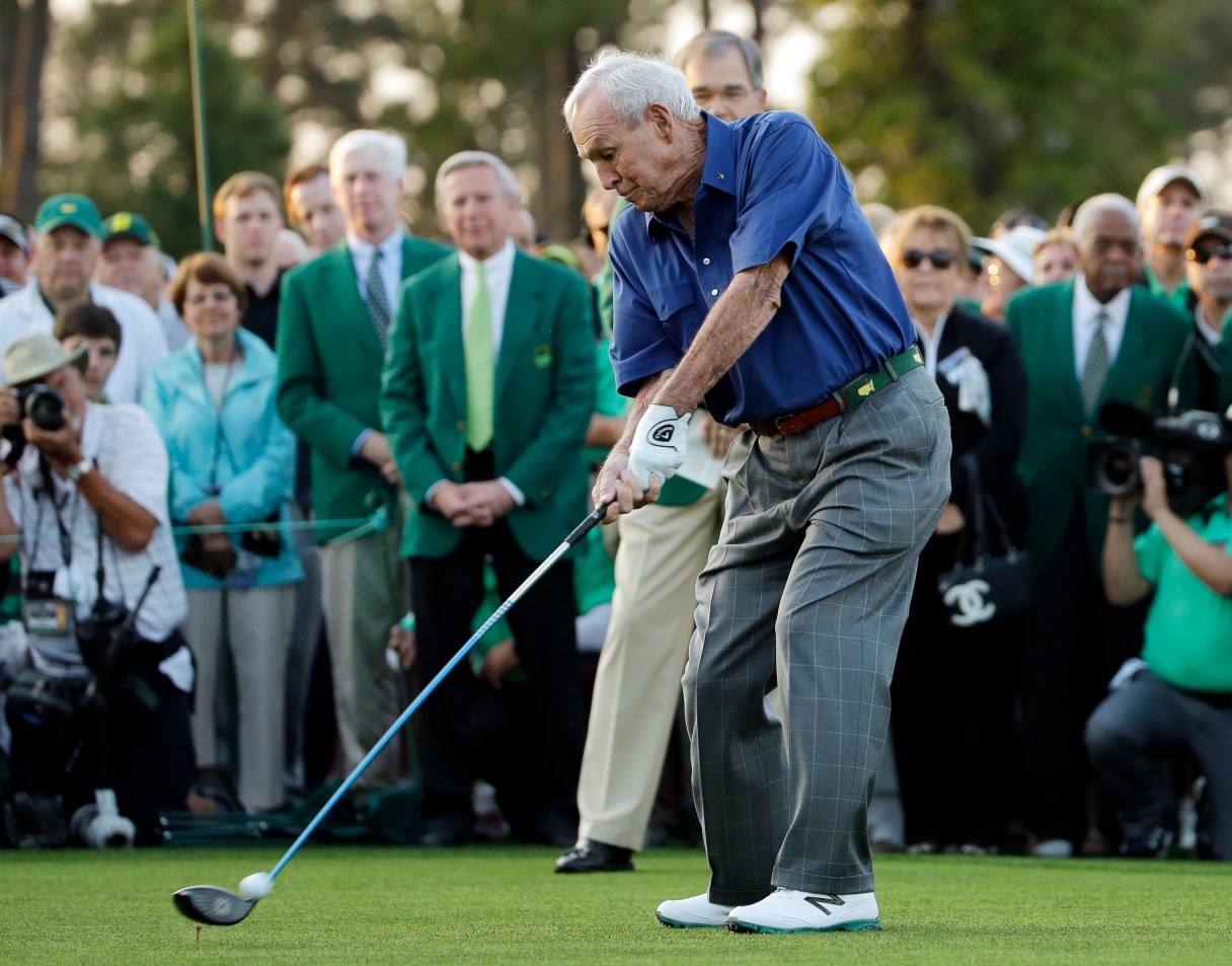 In this April 9, 2015, file photo, Arnold Palmer hits an honorary tee shot before the first round of the Masters golf tournament, in Augusta, Ga. (AP Photo/Matt Slocum, File)