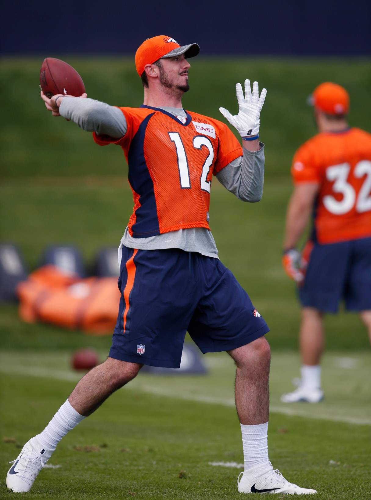 Denver Broncos rookie quarterback Paxton Lynch throws during the team's NFL rookie camp football practice Friday, May 6, 2016, in the team's headquarters in Englewood, Colo. (AP Photo/David Zalubowski)