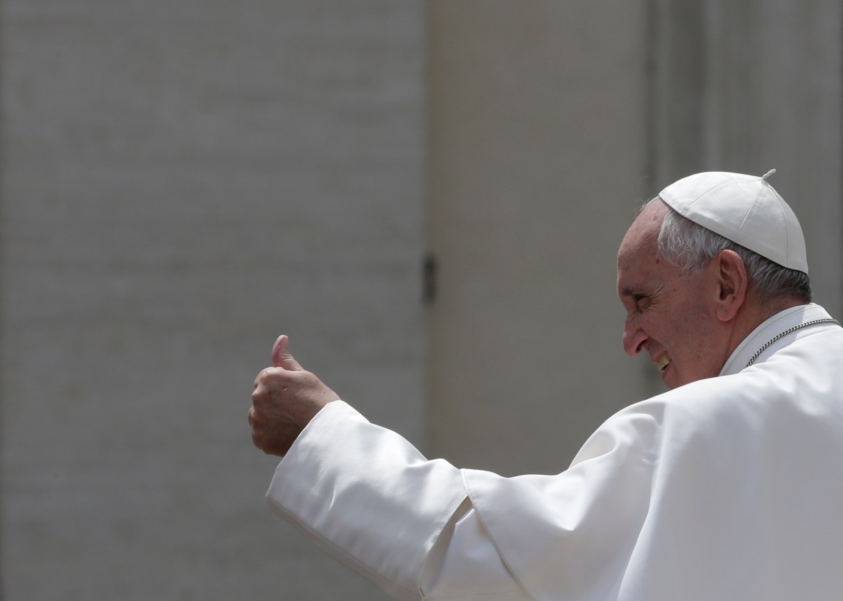 Pope Francis gives his thumbs up as he leaves after his weekly general audience in St. Peter's Square at the Vatican, Wednesday, May 18, 2016. (AP Photo/Alessandra Tarantino)