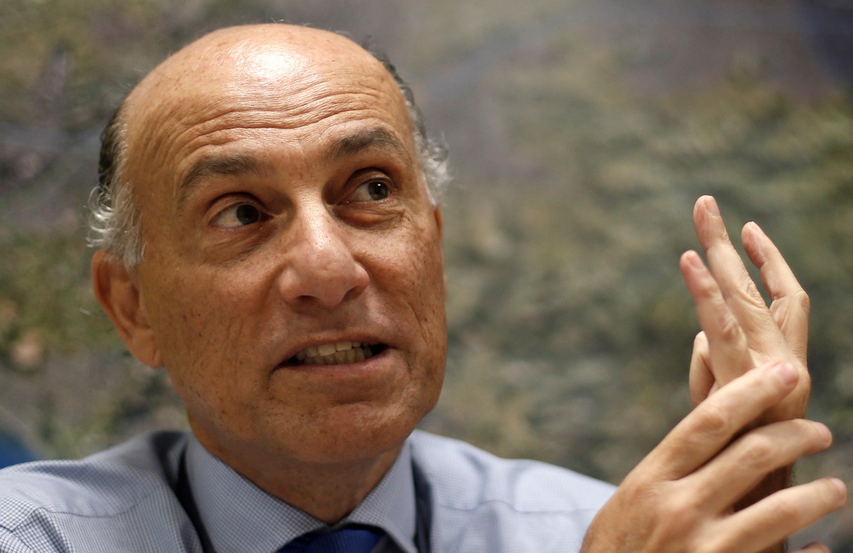 FILE - In this April 22, 2015, file photo, Sidney Levy speaks during an interview, in Rio de Janeiro, Brazil. The chief organizer of the Rio de Janeiro Olympics says security is his top concern, well ahead of the Zika virus. Sidney Levy, CEO of the Rio Organizing Committee, said Tuesday, June 28, 2016, the plan is to have 85,000 security personnel on the streets to keep athletes and visitors from harm. He calls the biggest fear a lone wolf attacker. (AP Photo/Silvia Izquierdo, File)