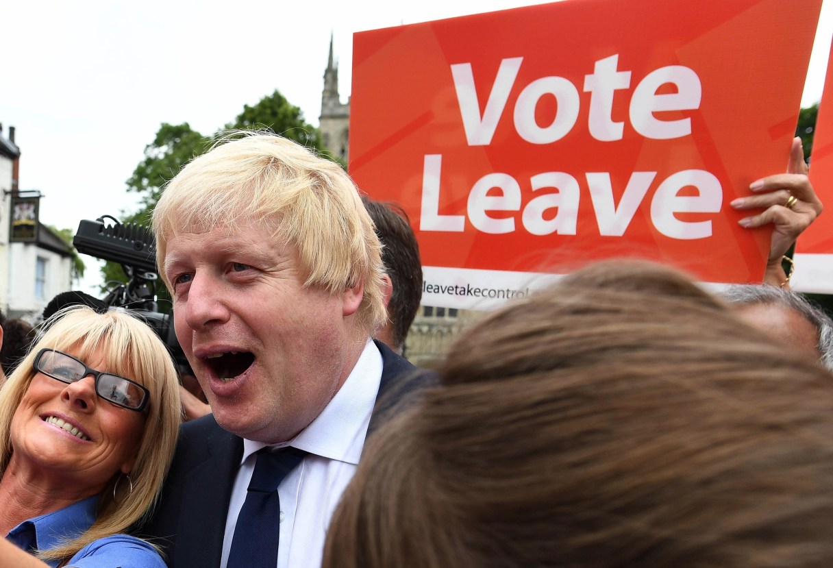 FILE In this Wednesday, June 22, 2016 file photo, advocate to exit Europe Boris Johnson poses for a selfie photo with voters during a whistle stop tour of the country on the final day of campaigning before Thursday's EU referendum vote, in Selby, north England. (Andrew Parsons / PA via AP, File) UNITED KINGDOM OUT - NO SALES - NO ARCHIVES