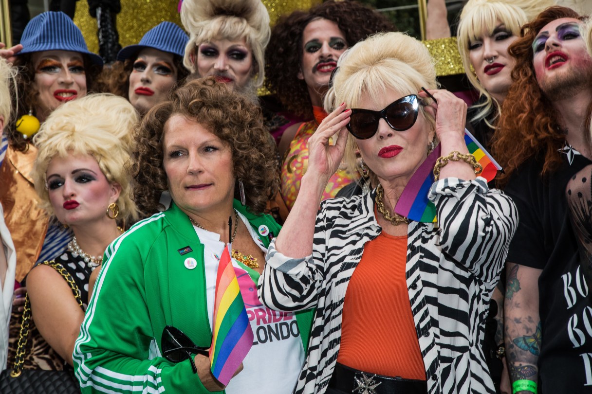 FILE - This is a Saturday June 25, 2016 file photo of British actresses Jennifer Saunders, left, and Joanna Lumley as they pose for photographers during a photo call to promote the film 'Absolutely Fabulous', during the annual Gay Pride parade in London. Jennifer Saunders and Joanna Lumley will be hoping to lift the spirits of a post-Brexit Britain when they attend the world premiere of “Absolutely Fabulous: The Movie” Wednesday June 29, 2016. (Photo by Vianney Le Caer/Invision/AP, File)