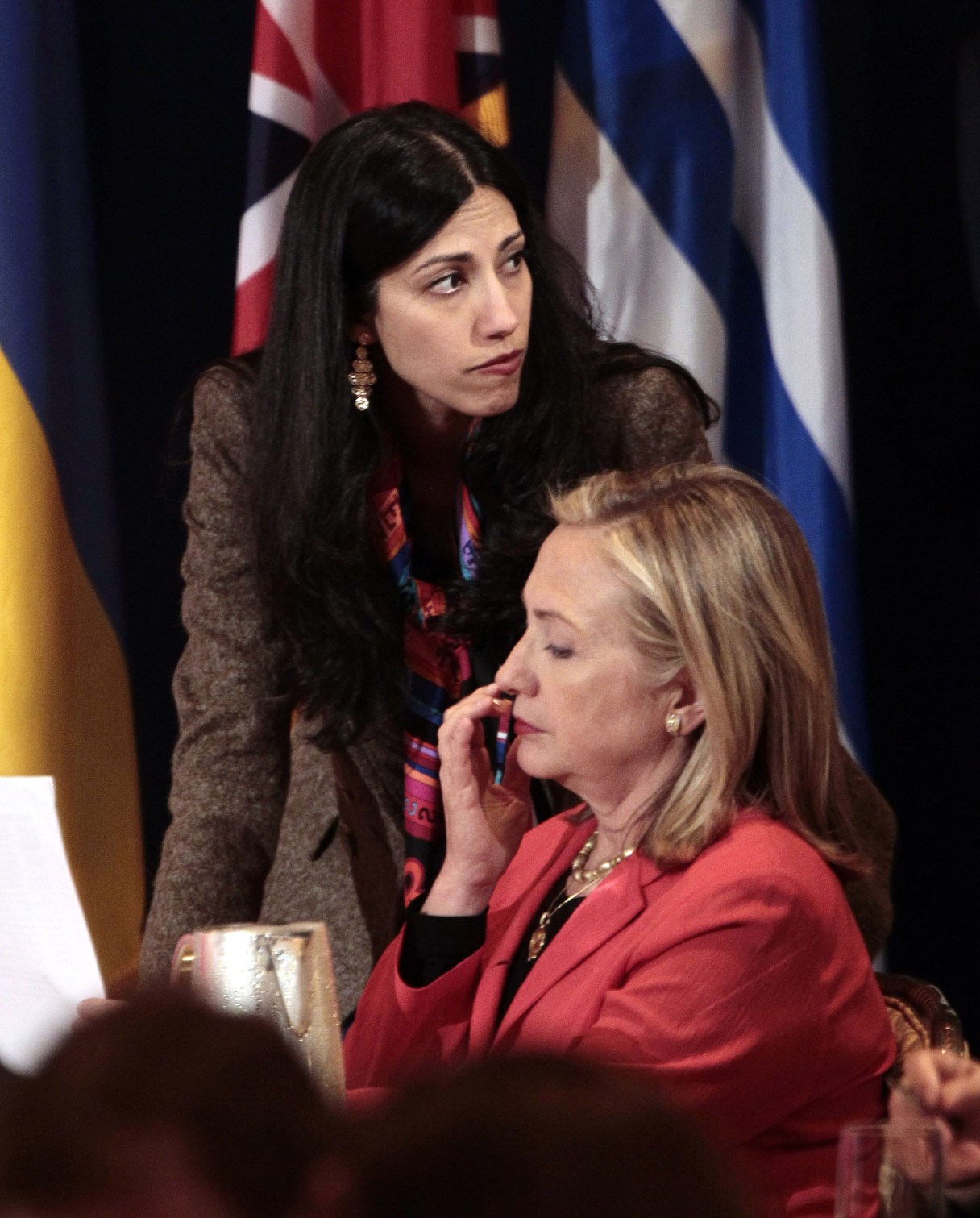 File - In this Sept. 20, 2011 file photo, Huma Abedin, top, deputy chief of staff and aide to Secretary of State Hillary Rodham Clinton, right, during a meeting with leaders for the Open Government Partnership in New York. A longtime Hillary Clinton aide Abedin said in a legal proceeding that Clinton did not want the State Department emails that she sent and received on her private computer server to be accessible to "anybody," according to transcripts released Wednesday, June 29, 2016. Her comments provided new insights into the highly unusual decision by the presumptive Democratic presidential candidate to operate a private email server in her basement to conduct government business as secretary of state. (AP Photo/Pablo Martinez Monsivais, File)