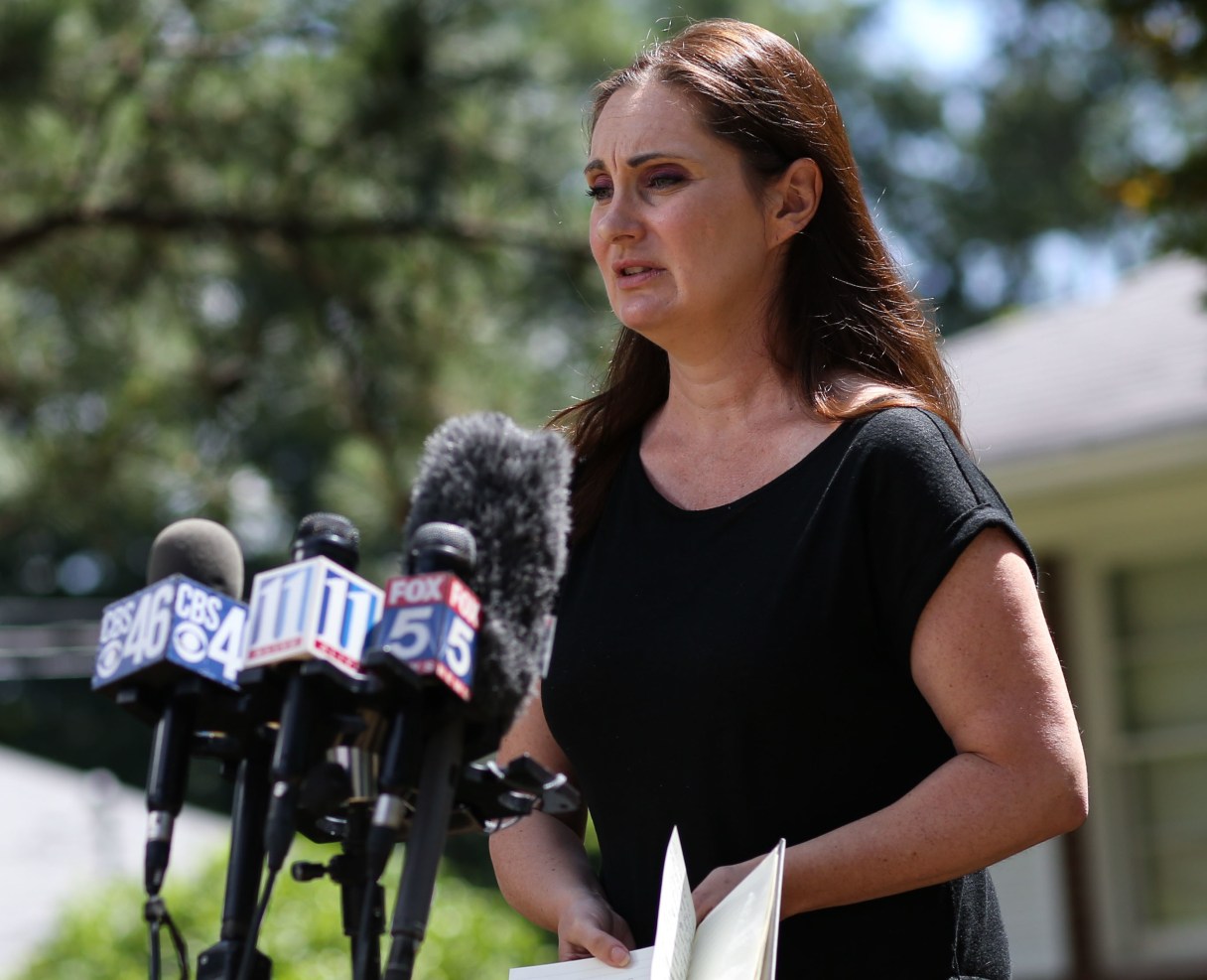 Georgia Assistant Attorney General Camila Wright speaks to the media in Mableton, Ga., on Friday, June 3, 2016, about the death of her husband. Detectives are searching for clues in the ride-booking records of Shahriar Zolfaghari, a slain Lyft driver who was married to Wright, Atlanta police said. (Branden Camp/Atlanta Journal-Constitution via AP)