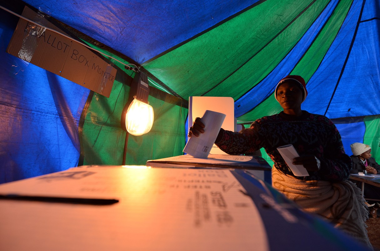 A woman casts her vote at a polling station in Atteridgeville, Pretoria, South Africa, Wednesday Aug. 3, 2016. South Africans are voting in municipal elections in which the ruling African National Congress seeks to retain control of key metropolitan areas despite a vigorous challenge from opposition parties. (AP Photo)