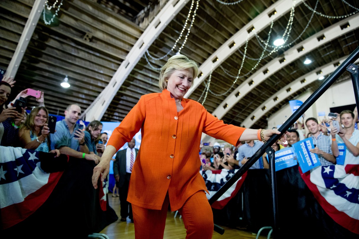 Democratic presidential candidate Hillary Clinton takes the stage at a rally at the Coliseum in St. Petersburg, Fla., Monday, Aug. 8, 2016. (AP Photo/Andrew Harnik)