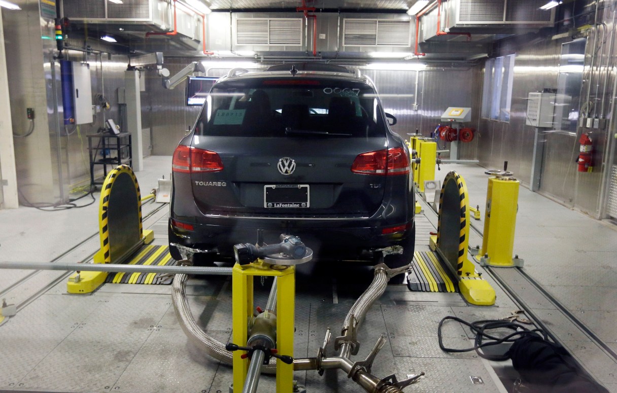 FILE - In this Oct. 13, 2015, file photo, a Volkswagen Touareg diesel is tested in the Environmental Protection Agency's cold temperature test facility in Ann Arbor, Mich. A Volkswagen engineer pleaded guilty Friday, Sept. 9, 2016, to one count of conspiracy in the company's emissions cheating scandal. James Robert Liang, of Newberry Park, Calif., entered the plea in U.S. District Court in Detroit. (AP Photo/Carlos Osorio, File)