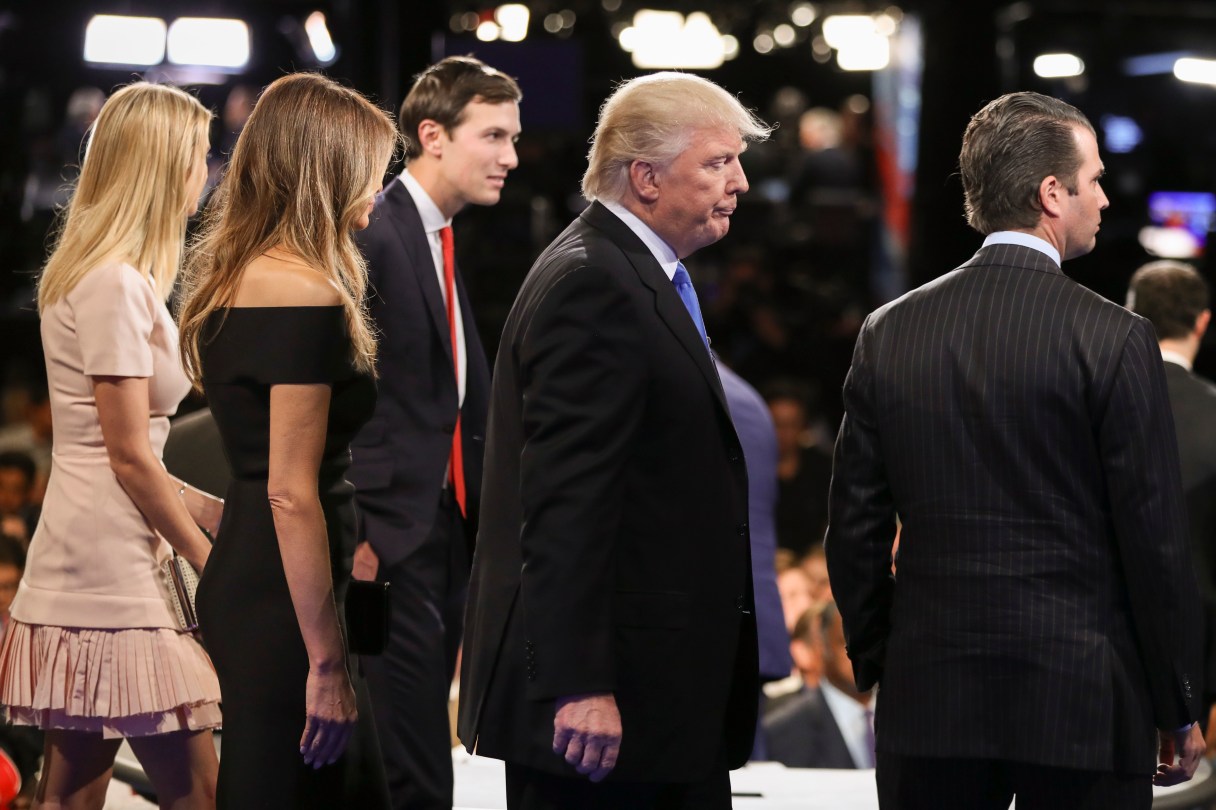 Republican presidential nominee Donald Trump walks off the stage with his family after the presidential debate with Democratic presidential nominee Hillary Clinton at Hofstra University in Hempstead, N.Y., Monday, Sept. 26, 2016. (Joe Raedle/Pool via AP)