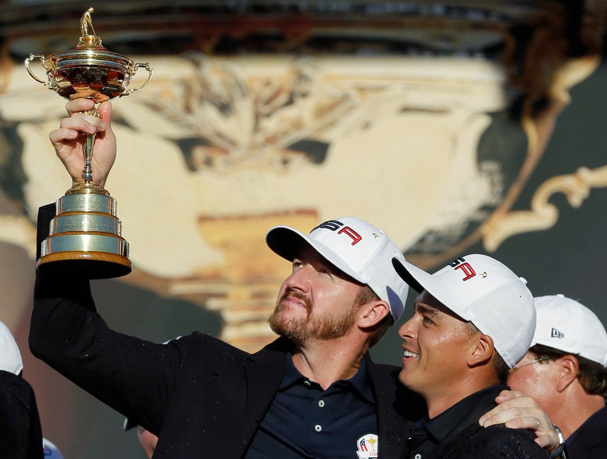 United States’ Rickie Fowler and United States’ Jimmy Walker celebrate during the closing ceremony of the Ryder Cup golf tournament Sunday, Oct. 2, 2016, at Hazeltine National Golf Club in Chaska, Minn. (AP Photo/David J. Phillip)