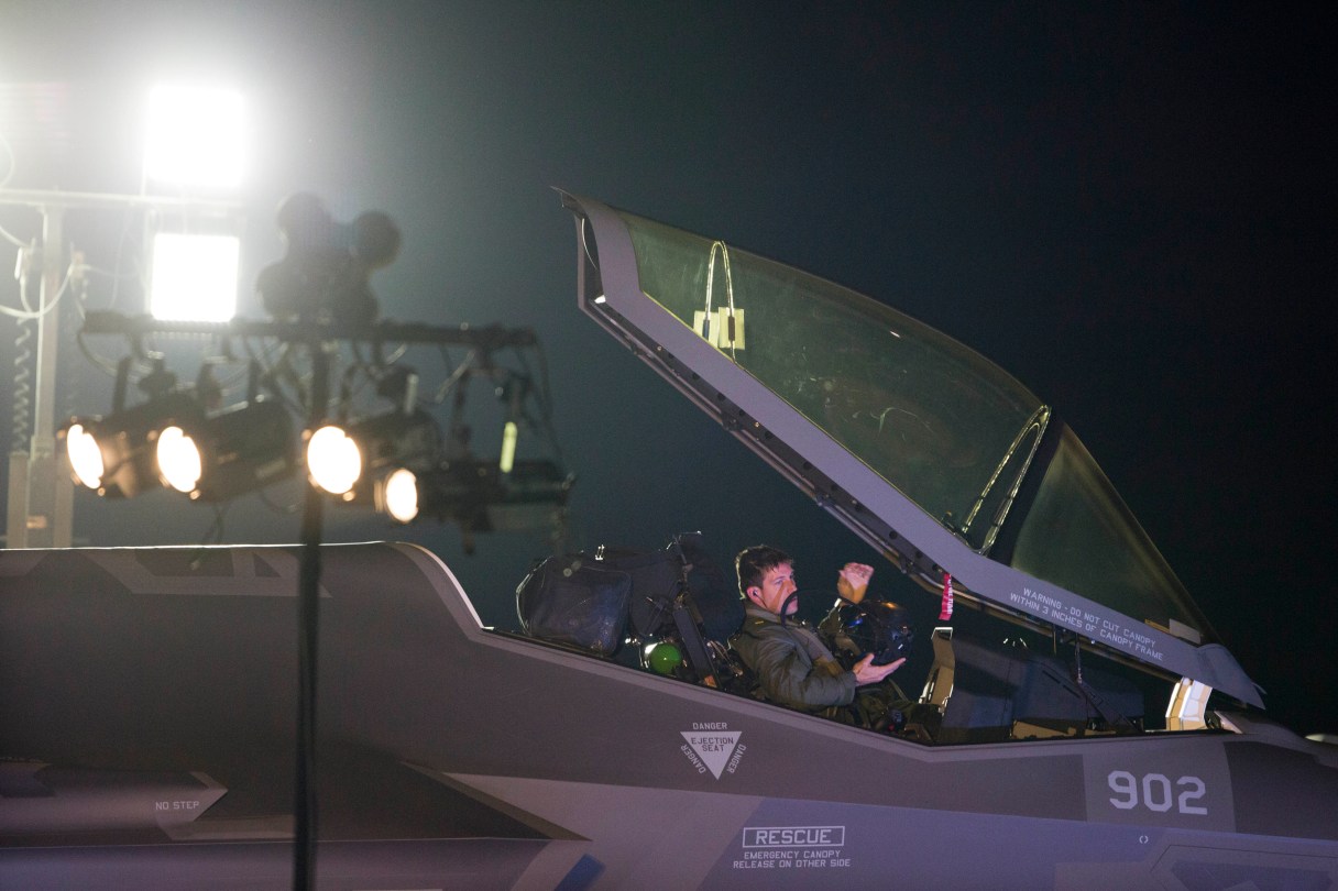 An American pilot sits in side one of the first two next-generation F-35 fighter jets after it landed during an unveiling ceremony upon arrival in Nevatim Air Force base near Beersheba, Southern Israel, Monday, Dec. 12, 2016. The vanguard of Israel's new fleet of F-35 fighter jets roared onto the Nevatim air base Monday, ushering in a new era for Israeli air power and sharpening its military edge in a volatile Mideast. The arrival of Israel's first two F-35 stealth aircraft also highlighted the Obama administration's commitment to providing its ally with the latest U.S. military advances. An elaborate ceremony at Nevatim in southern Israel was delayed several hours because poor weather kept the F-35s from taking off from Italy for the flight to Israel. (AP Photo/Ariel Schalit)