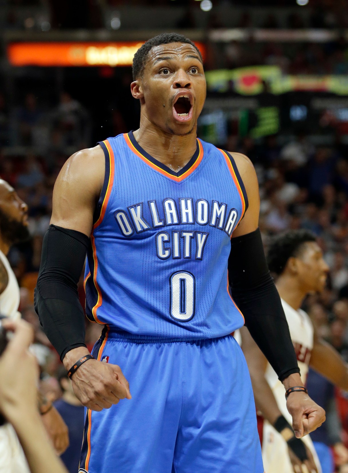 Oklahoma City Thunder guard Russell Westbrook celebrates after scoring against the Miami Heat during the first half of an NBA basketball game, Tuesday, Dec. 27, 2016, in Miami. (AP Photo/Alan Diaz)