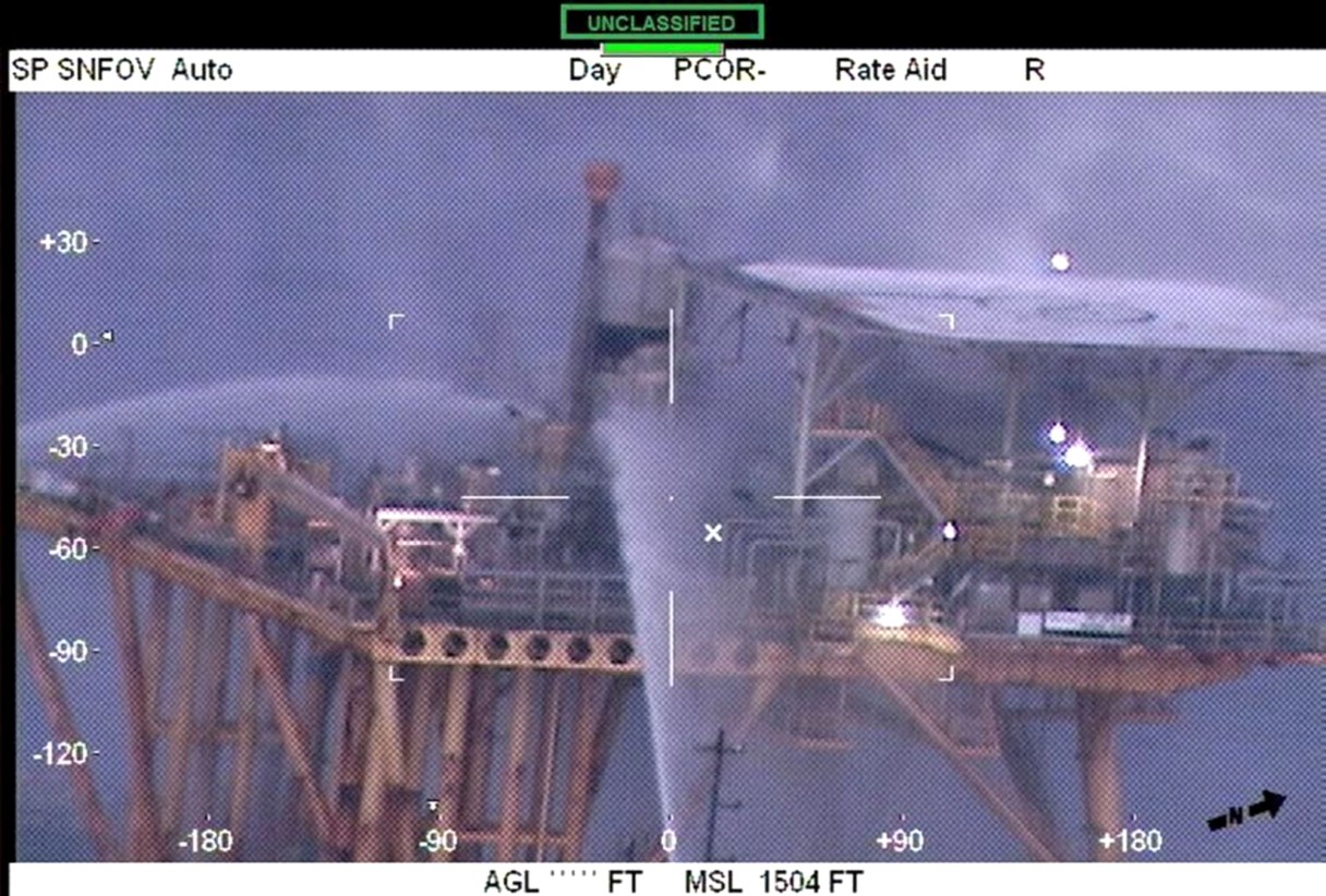 In this image taken from video and released by the U.S. Coast Guard, four offshore supply vessels extinguish a fire on an oil production platform fire 80 miles south off Grand Isle, La., Thursday, Jan. 5, 2016. The pre-dawn fire has been extinguished on an oil production platform in the Gulf of Mexico, and there is no sign of pollution in the area, authorities said Thursday. There were no reports of injuries. (U.S. Coast Guard via AP)
