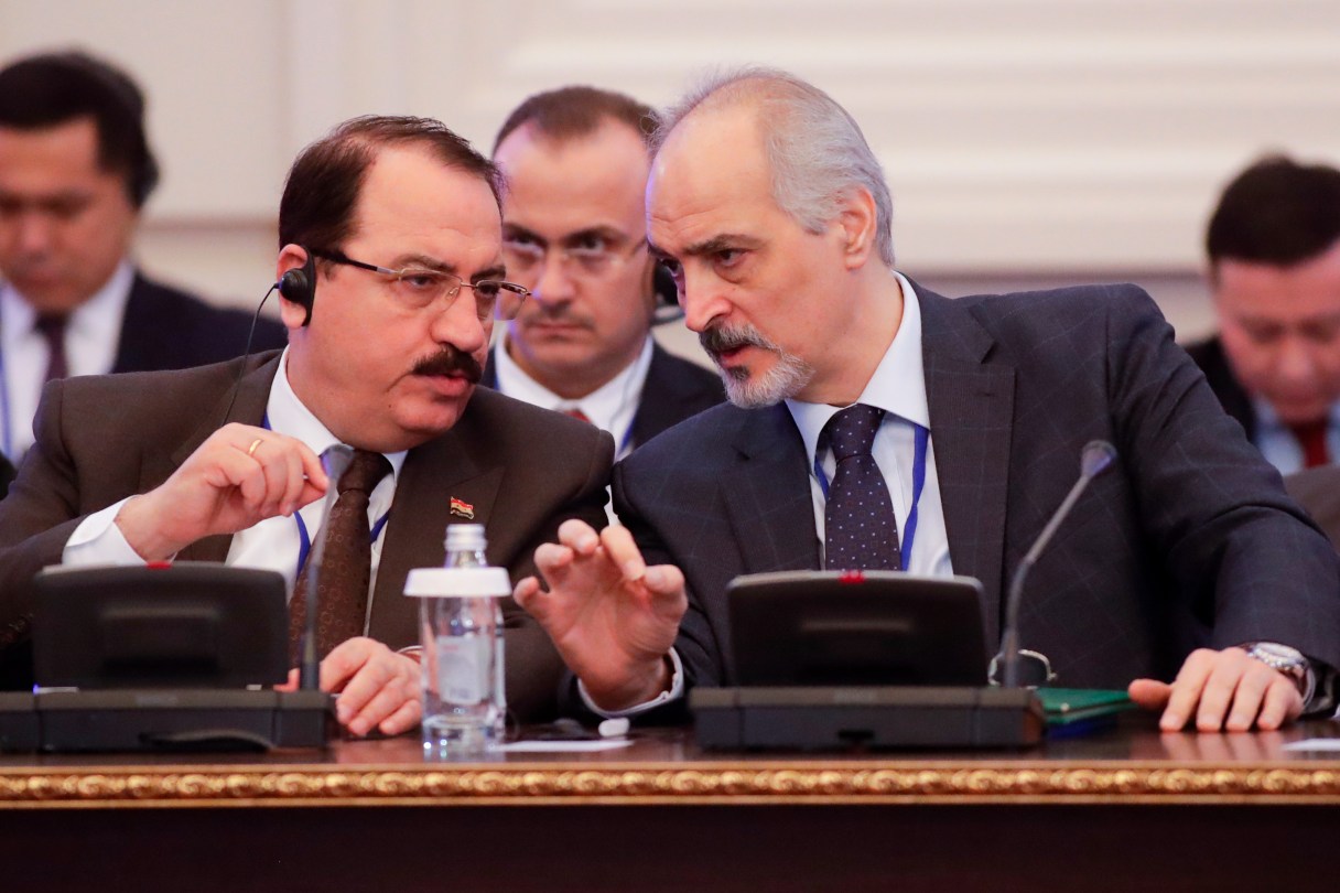 Bashar Jaafari, Syrian Ambassador to the UN and head of the Syrian delegation, right, speaks to a member of Syrian delegation during the talks on Syrian peace in Astana, Kazakhstan, Monday, Jan. 23, 2017. Syria talks brokered by Russia, Turkey and Iran aimed at bolstering a shaky cease-fire in place since last month opened on Monday in Kazakhstan, marking the first face-to-face meeting between the Damascus government representatives and rebel factions trying to overthrow it. The gathering is also the start of a new effort to end six years of carnage that has killed hundreds of thousands, displaced half of Syria’s population and sent millions of refugees to neighboring countries and Europe. (AP Photo/Sergei Grits)