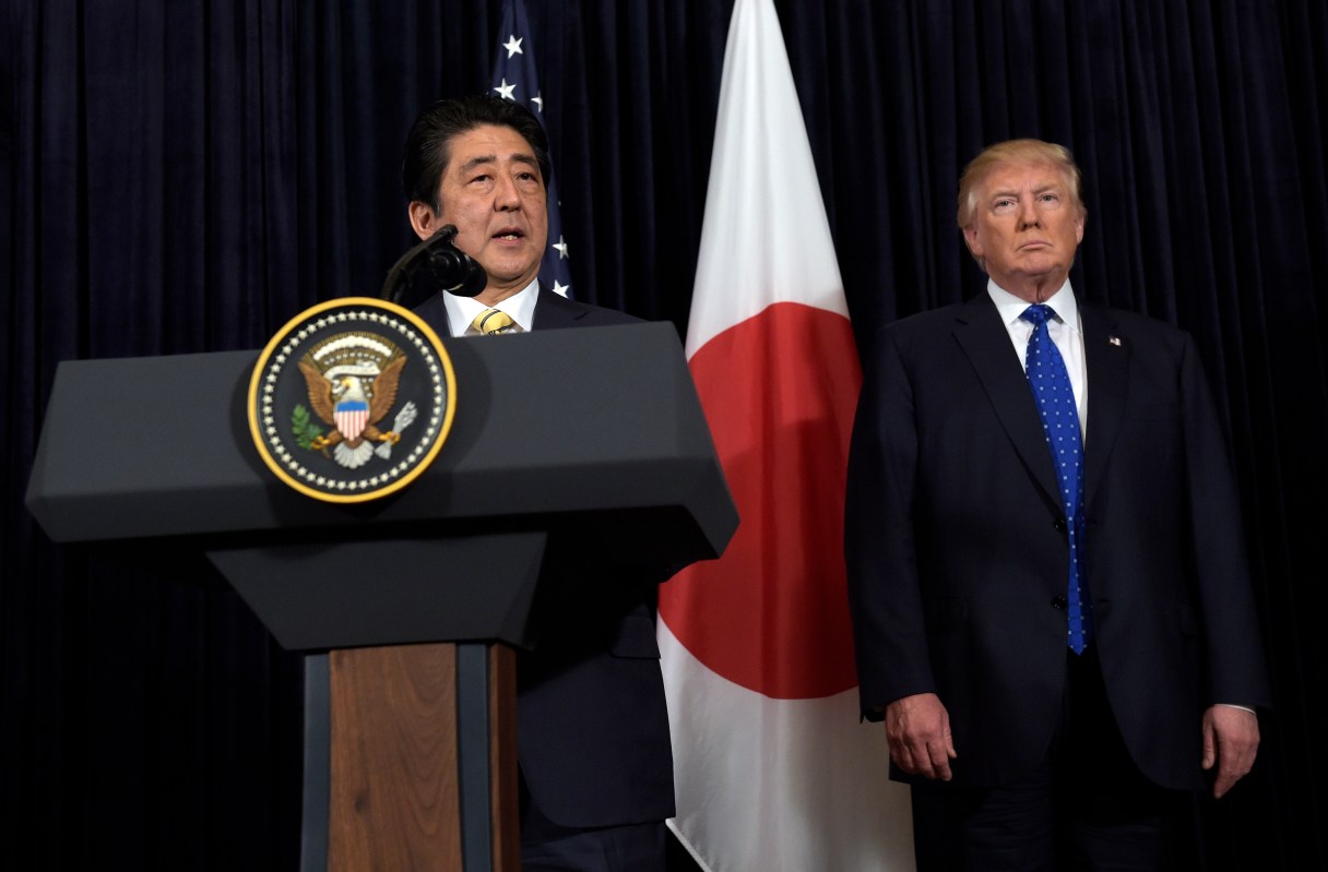 President Donald Trump and Japanese Prime Minister Shinzo Abe make statements about North Korea at Mar-a-Lago in Palm Beach, Fla., Saturday, Feb. 11, 2017. (AP Photo/Susan Walsh)