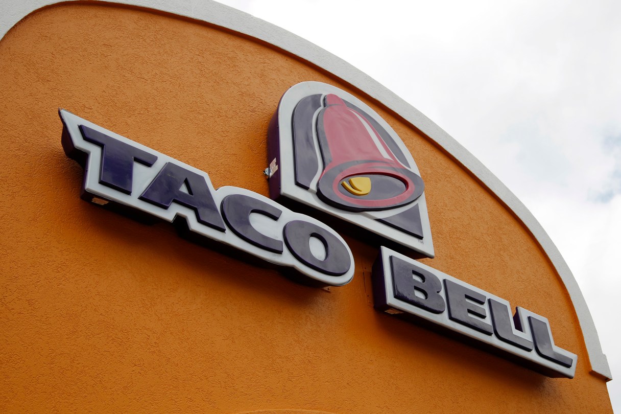 FILE - This Friday, May 23, 2014, file photo, shows the sign at a Taco Bell in Mount Lebanon, Pa. Taco Bell spokesman Rob Poetsch said Feb. 23, 2017, that theits Naked Chicken Chalupa, a sandwhich with a shell made out of fried chicken, will be pulled from menus as it was always intended to be a limited time offer. (AP Photo/Gene J. Puskar, File)