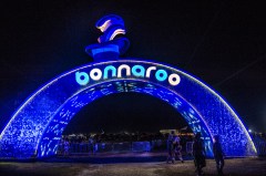 FILE - In this June 10, 2016 file photo, a lighted archway leading onto the farm appears at the Bonnaroo Music and Arts Festival in Manchester, Tenn. Music fans will have more options to dance the night away at the Bonnaroo Music and Arts Festival, which is unveiling an all-night stage focusing on dance, electronic and hip hop artists. The Other stage will run all night at this year’s festival, which is scheduled for June 8-11 in Manchester, Tennessee. The lineup includes Marshmello, Big Gigantic, Yellow Claw, D.R.A.M., Motama, Louis the Child, Borgore and more. (Photo by Amy Harris/Invision/AP, File)