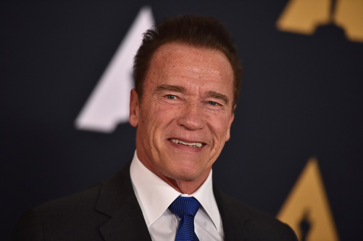 FILE - In this Nov. 12, 2016 file photo, Arnold Schwarzenegger arrives at the 2016 Governors Awards in Los Angeles. Schwarzenegger tells Men's Journal for an article published online on March 2, 2017, that he doesn't dwell on the affair that cost him his marriage to Maria Shriver and is focused on having a great relationship with his kids. (Photo by Jordan Strauss/Invision/AP, File)