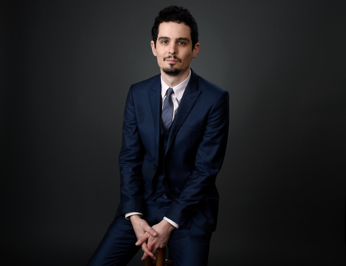 FILE - In this Feb. 6, 2017 file photo, Damien Chazelle poses for a portrait at the 89th Academy Awards Nominees Luncheon in Beverly Hills, Calif. Universal Pictures on Tuesday, March 7, dated Chazelle’s “First Man,” starring Ryan Gosling as astronaut Neil Armstrong, for October 12, 2018. The release date will return Chazelle to the heart of awards season with the follow-up to his musical sensation, "La La Land." (Photo by Chris Pizzello/Invision/AP, File)