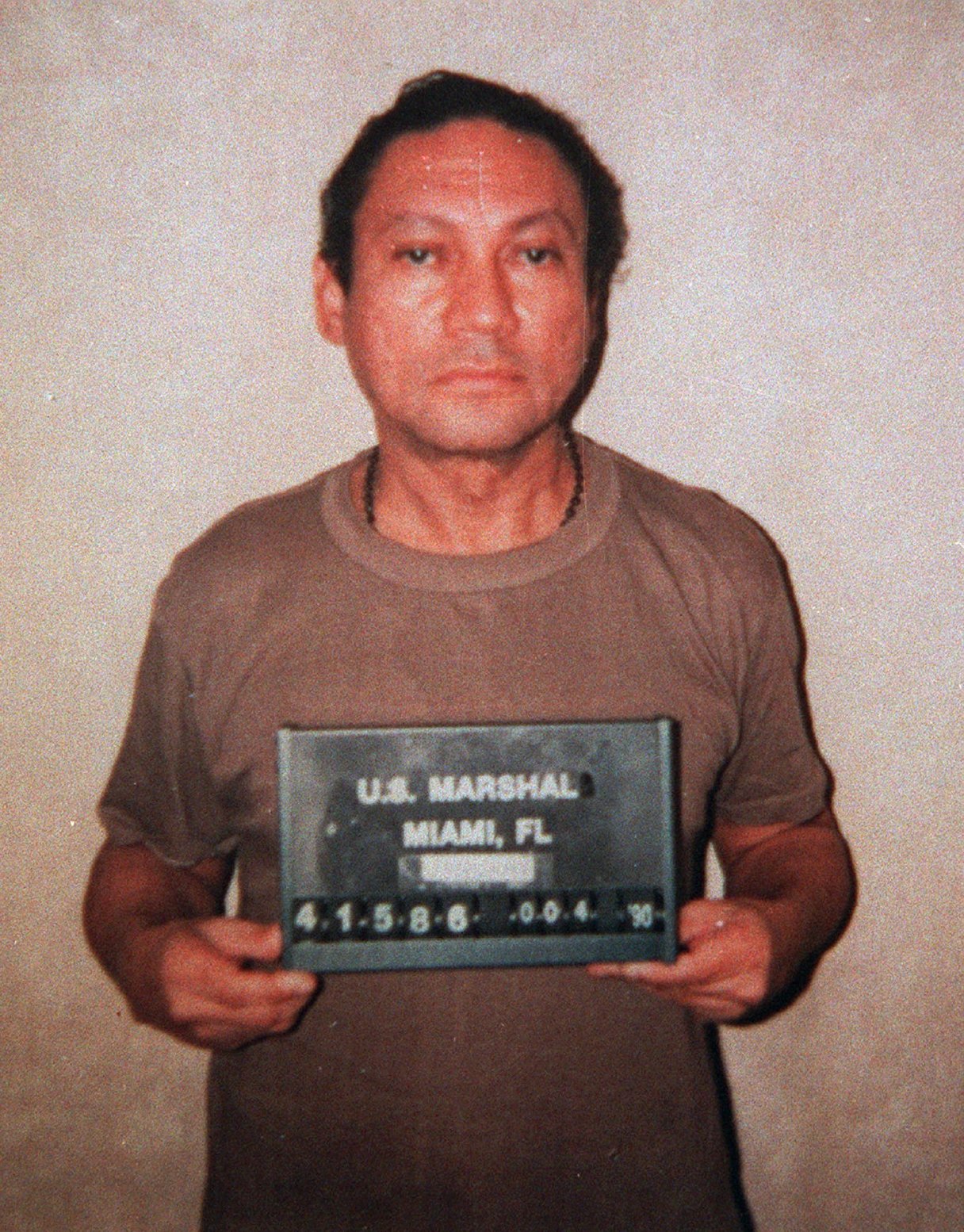ADDS CONFIRMATION BY PANAMANIAN PRESIDENT, FILE - This Jan.1990, file photo shows deposed Panamanian Gen. Manuel Antonio Noriega, who is serving a 40-year sentence in Miami for drug trafficking. Former Panamanian dictator Noriega died late Monday, May 29, 2017, at age 83. Panamanian President Juan Carlos Varela wrote in his Twitter account that "the death of Manuel A. Noriega closes a chapter in our history." (AP Photo, File)
