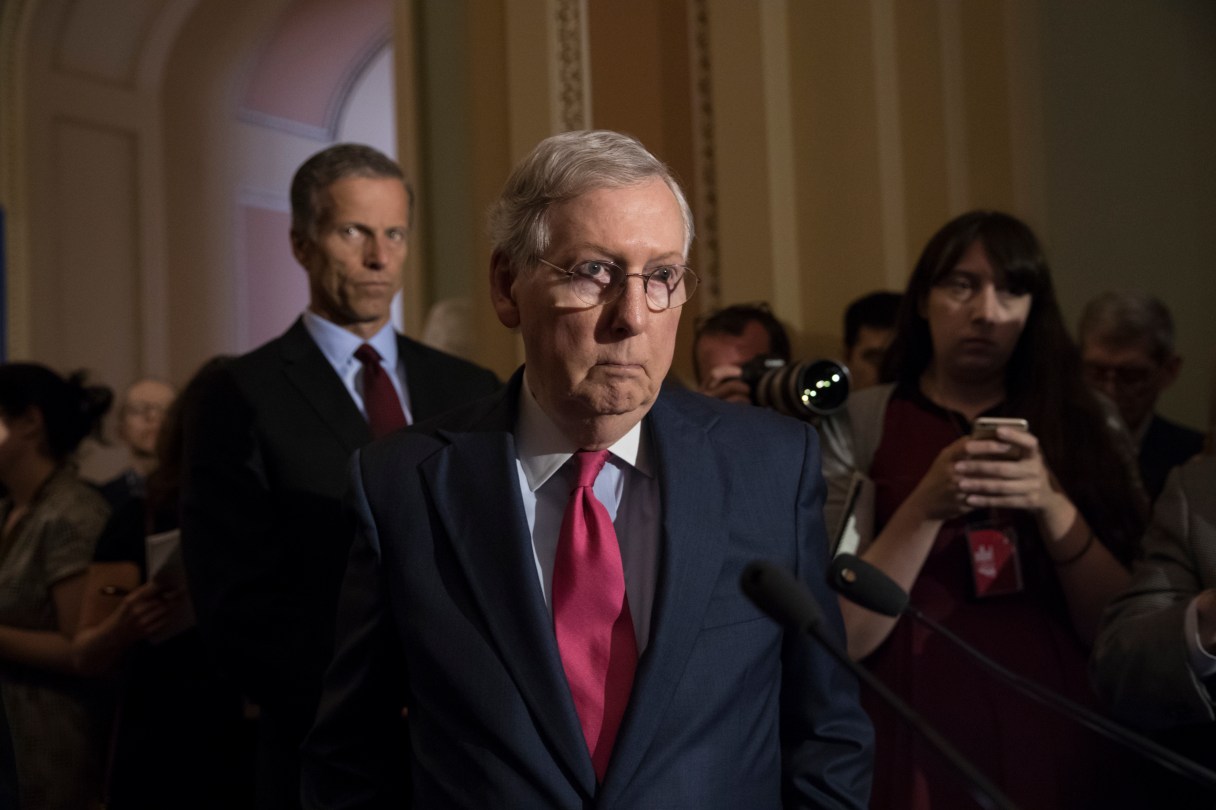 Senate Majority Leader Mitch McConnell of Ky., joined by Sen. John Thune, R-S.D., left, reacts to questions from reporters about President Donald Trump reportedly sharing classified information with two Russian diplomats during a meeting in the Oval Office, Tuesday, May 16, 2017, on Capitol Hill in Washington. (AP Photo/J. Scott Applewhite)