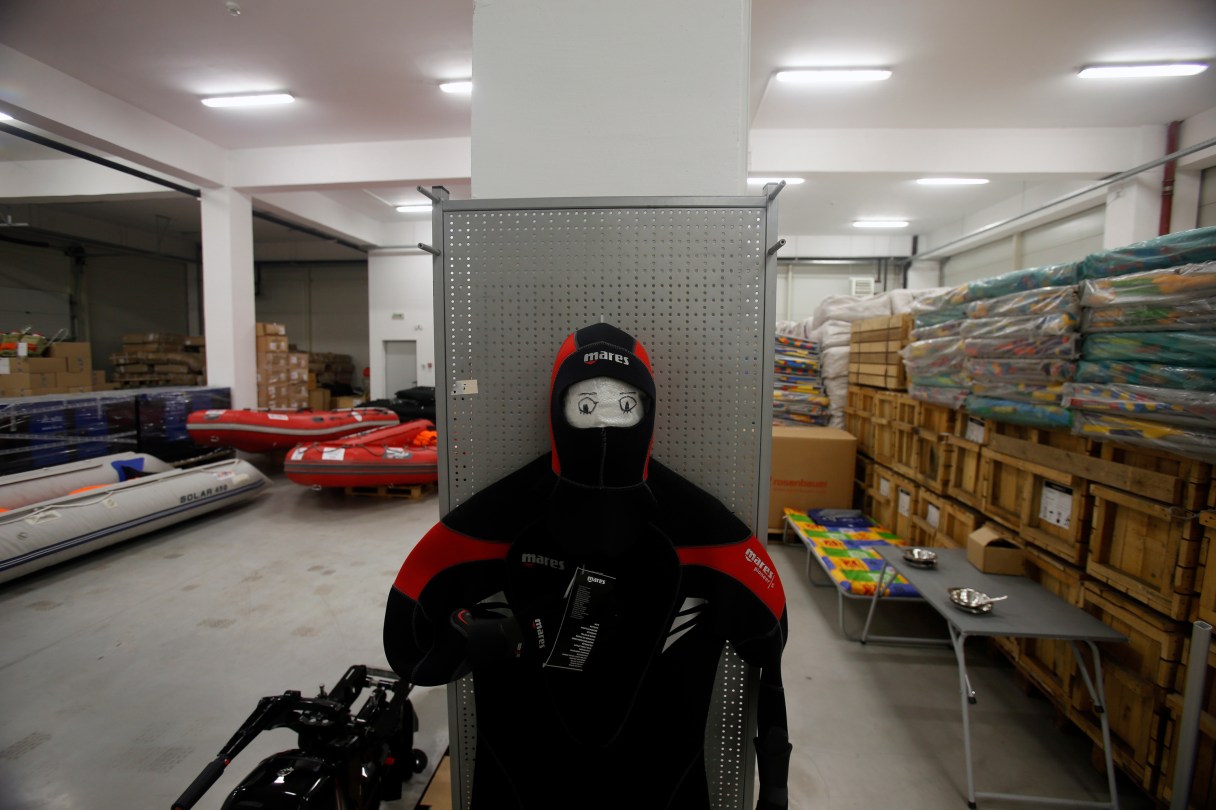 FILE - In this Sept. 29, 2016. file photo, humanitarian aid delivered from Russia in a warehouse in a "Russian-Serbian Humanitarian Center" near an airport in the town of Nis, Serbia. Serbia's foreign minister Ivica Dacic has urged authorities to grant diplomatic status to the Russian staff of a controversial facility in the Balkan country, despite Western objections against such a move. (AP Photo/Darko Vojinovic, File)
