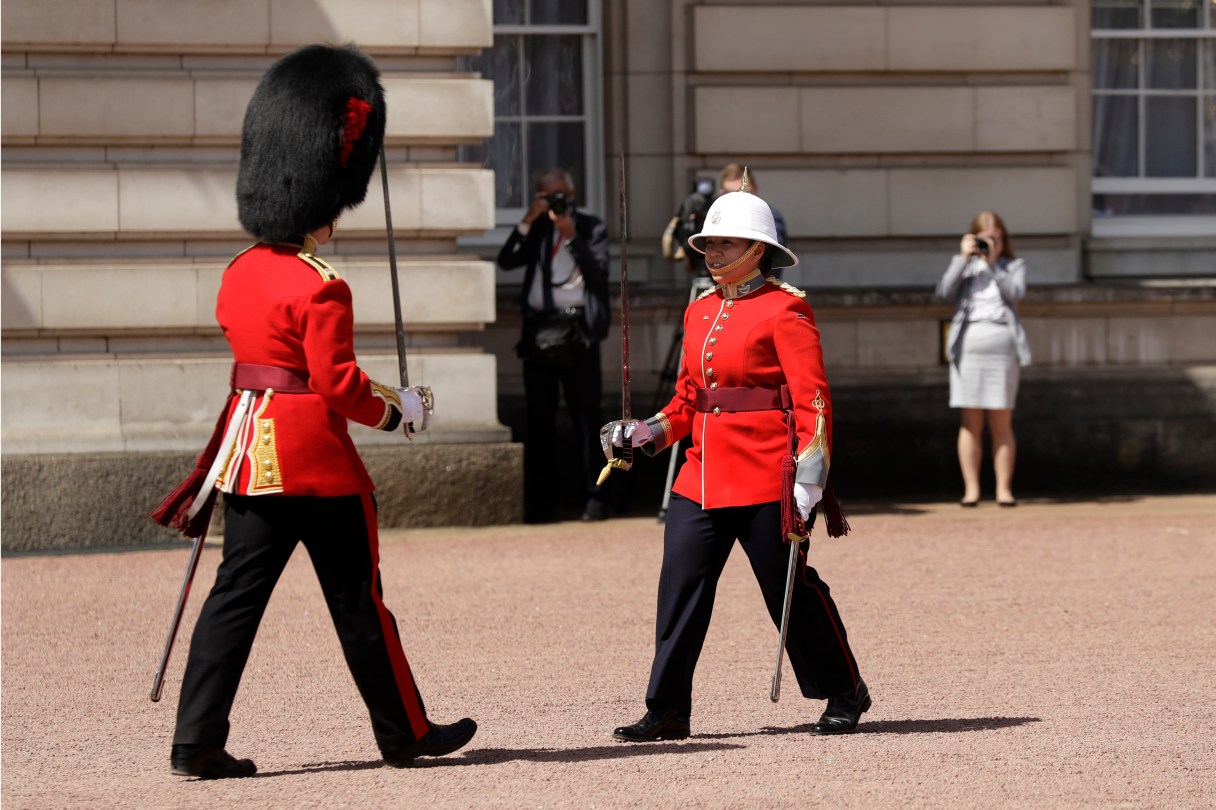 Canadian Captain Megan Couto, right, makes history by becoming the first female Captain of the Queen's Guard as she takes part in the Changing the Guard ceremony at Buckingham Palace in London, Monday, June 26, 2017. Couto and her unit, The Second Battalion, Princess Patricia's Canadian Light Infantry (2PPCLI), known as "The Patricia's", took part in the ceremony Monday to coincide with the 150th anniversary of Canada and the sesquicentennial anniversary of Canadian Confederation. (AP Photo/Matt Dunham)