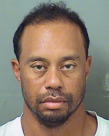 FILE- This image provided by the Palm Beach County Sheriff's Office on Monday, May 29, 2017, shows Tiger Woods. Woods' arraignment hearing on his DUI arrest has been postponed until Aug. 9, 2017, according to court documents filed Thursday, June 15, 2017. (Palm Beach County Sheriff's office via AP, File)