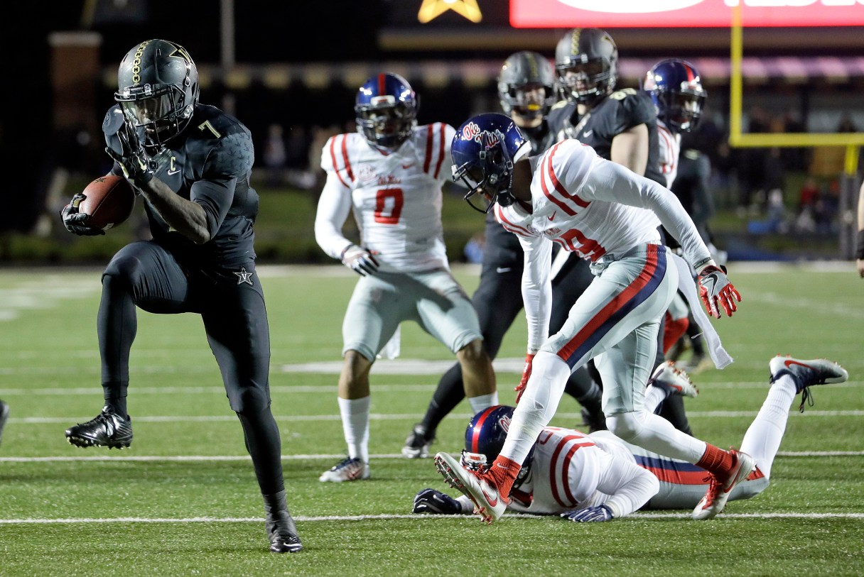 Vanderbilt running back Ralph Webb leaves Ole Miss defenders in his wake during an 11-yard touchdown run last November in Nashville.
