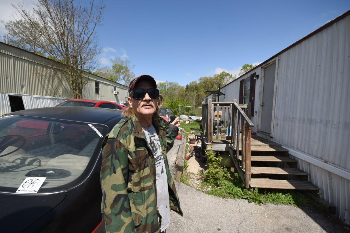 Marshall Wilson talks about have a dog pen at his trailer homeint Stoney Pointe Mobile Home Park in Rossville.