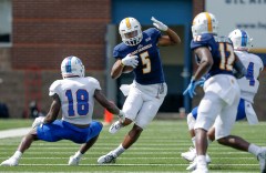 UTC wide receiver Bingo Morton (5) breaks around teammate Xavier Borishade (12) at Chattanooga's Finley Stadium.