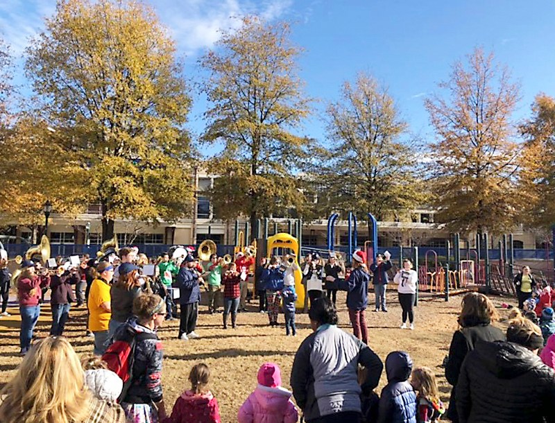 Members of the Marching Mocs play for kids at the Siskin Children's Institute, where Andy Bittenbender attended as a child. (Contributed photo by Debbie Bittenbender)