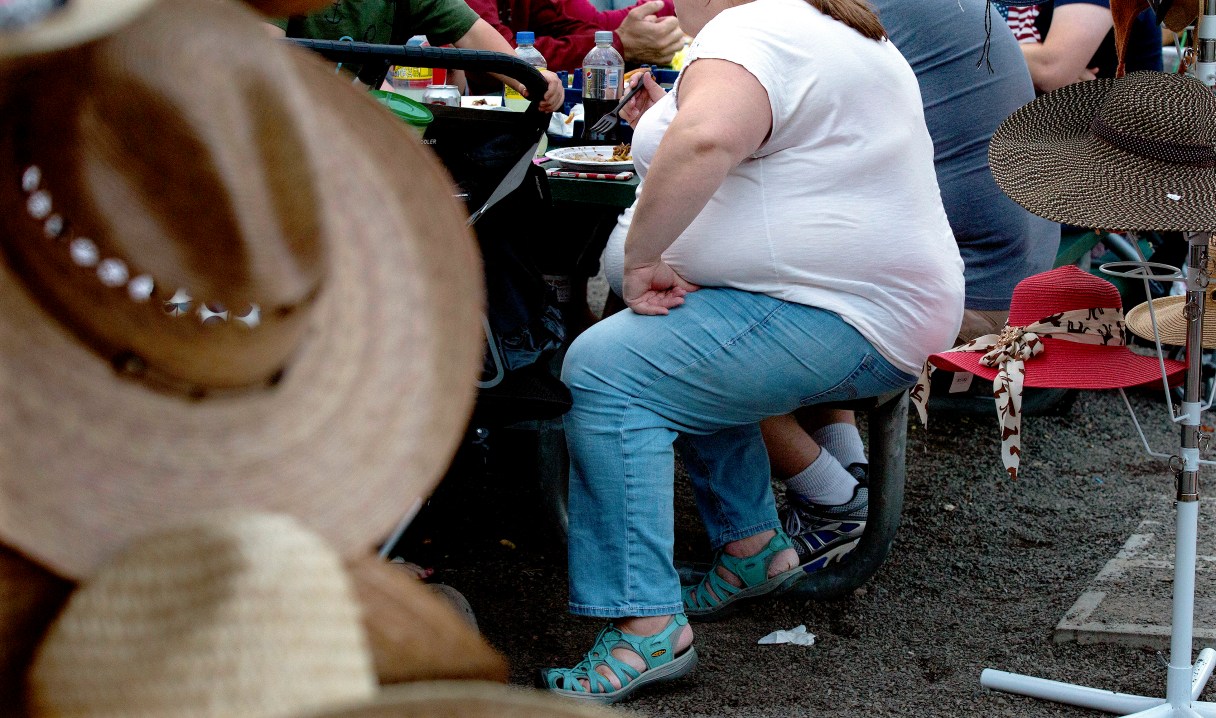 FILE ѠOverweight people at the Evergreen State Fair in Monroe, Wash., Sept. 9, 2015. Over the past 10 years, short-term disability claims for joint disorders have increased 38%, and long term disability claims for joint disorders are up 57%. Greg Breter, senior vice president of Benefits at Unum, said the rising rate of obesity is the primary driver in the growing number of claims. One in three Tennesseans are considered obese, according to the CDC. (Ruth Fremson/The New York Times)
