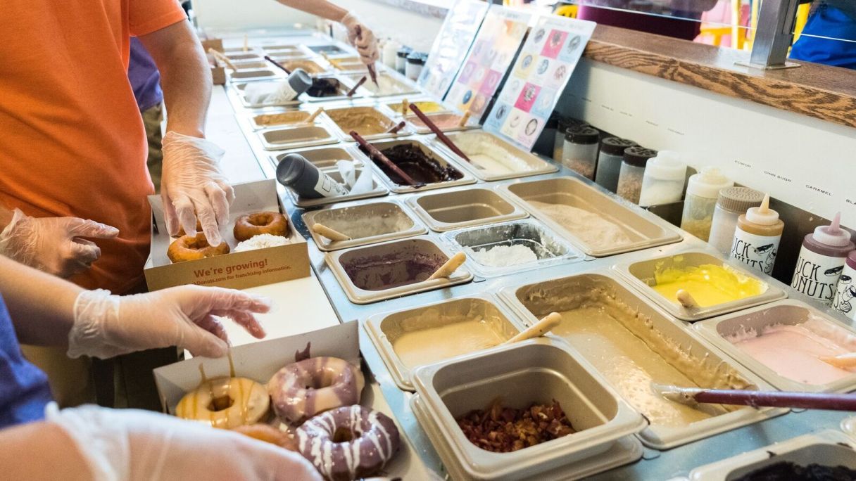 Duck Donuts cooks and prepares doughnuts made to order for its customers. A new shop will open in Chattanooga later this year. / Contributed photo by Duck Donuts