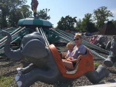 Alex Bright and Christie Irons, from left, enjoy a ride during a Chattanooga Autism Center outing to Lake Winnie Amusement Park. The center's New Year's Eve event at The Granfalloon raises funds for similar outings. / Contributed photo by Celeste Lipps